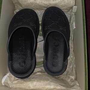 Gucci Black Rubber Clogs - Embossed Logo